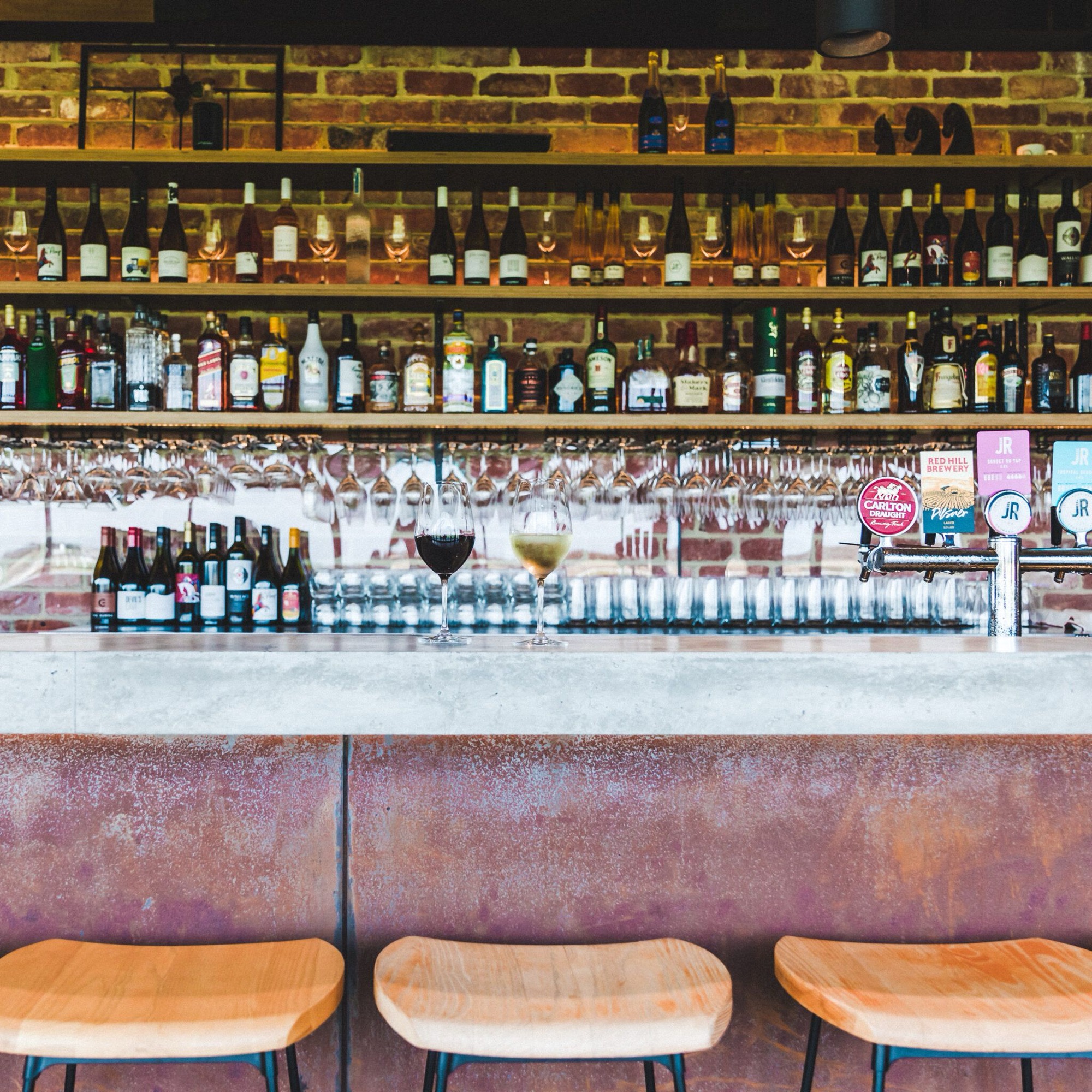 Loft-style bar with brick and timber