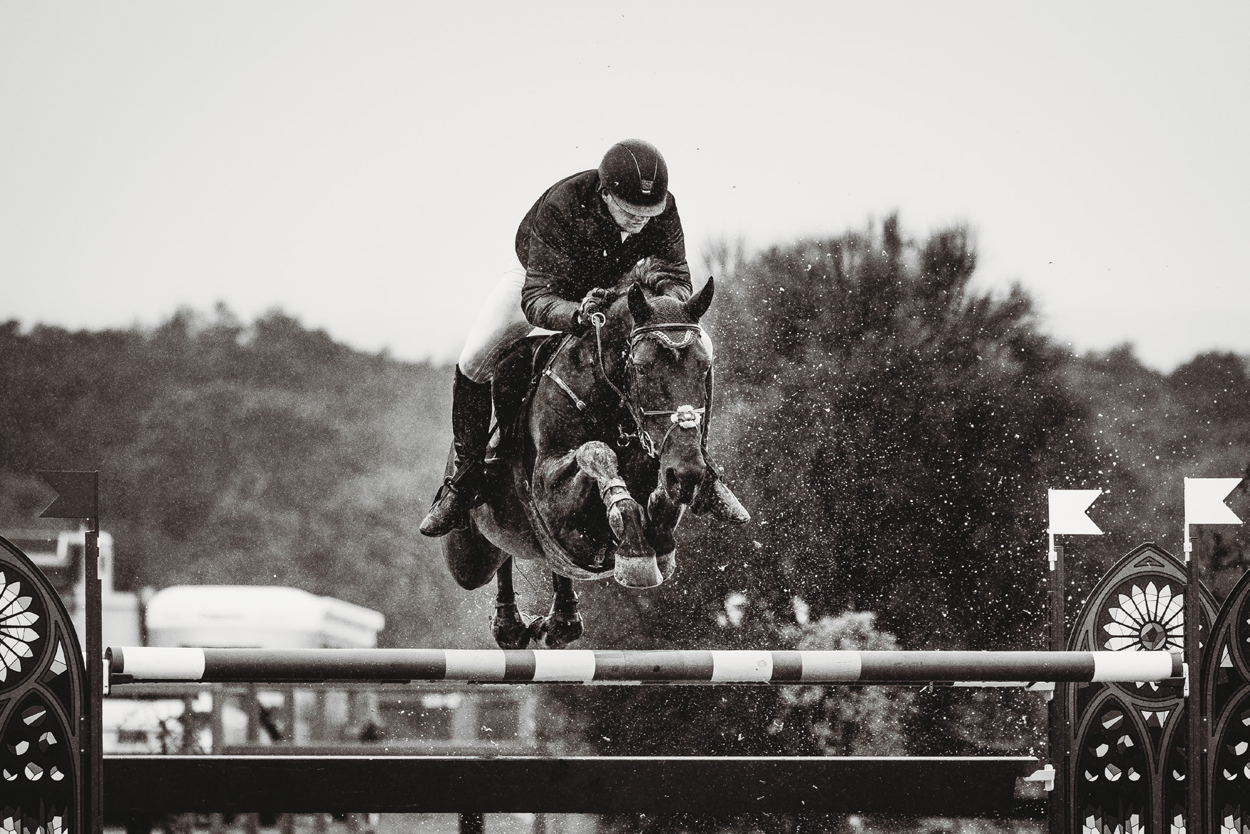 Showjumper clearing a fence