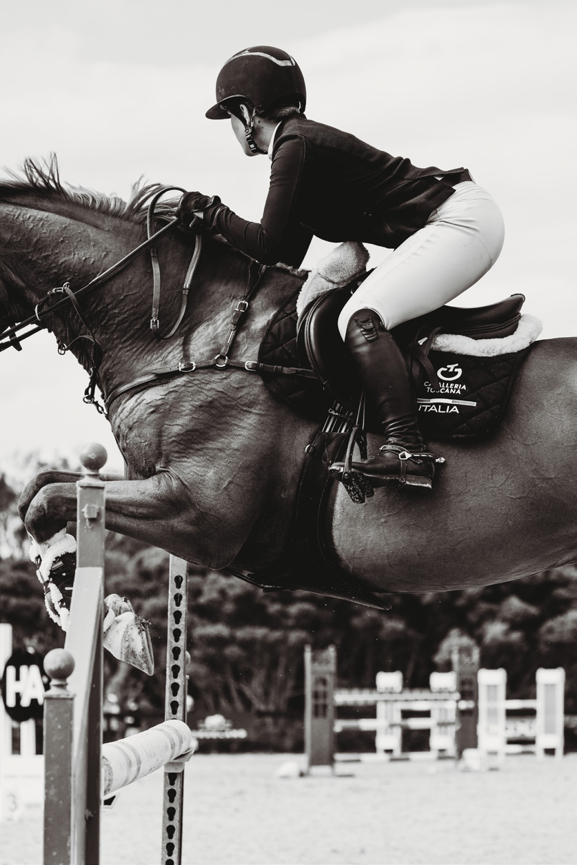 Rider’s boot in the stirrup, in black and white